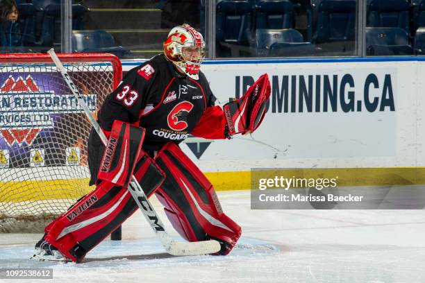 Isaiah DiLaura of the Prince George Cougars warms up in net against the Kelowna Rockets at Prospera Place on January 4, 2019 in Kelowna, Canada.