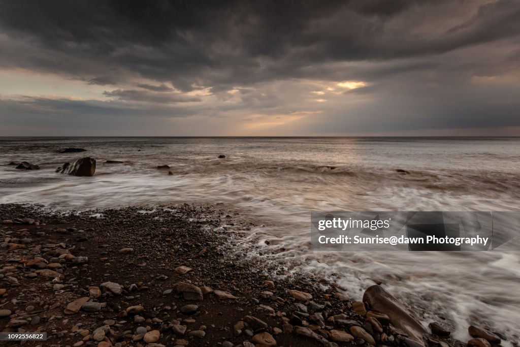 Light On Rocks Dusk Light On Rocks High-Res Stock Photo - Getty Images