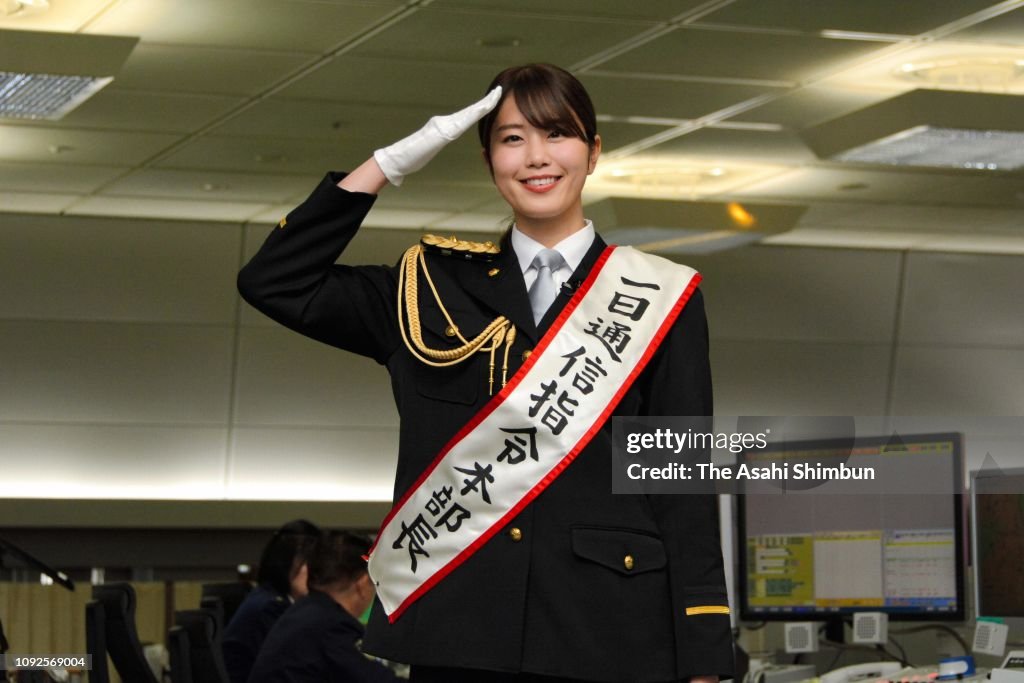 Amy Inamura Ami Inamura, a model and TV personality, takes a mock emergency call ...