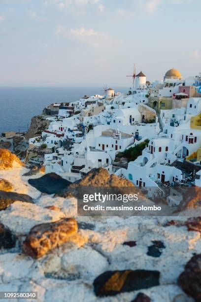 traditional greek village at morning, santorini - grekiska övärlden bildbanksfoton och bilder