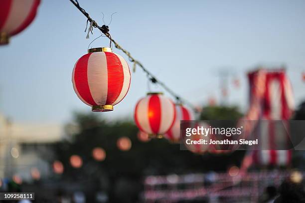 japanese festival lanterns in the evening - paper lanterns stock pictures, royalty-free photos & images