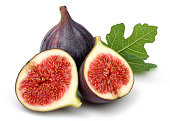 Fresh purple fig fruit and slices with leaf