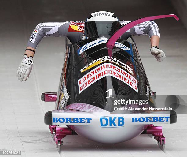 Pilot Sandra Kiriasis and Berit Wiacker of Team Germany 1 starts at the second run of the women's Bobsleigh World Championship on February 18, 2011...