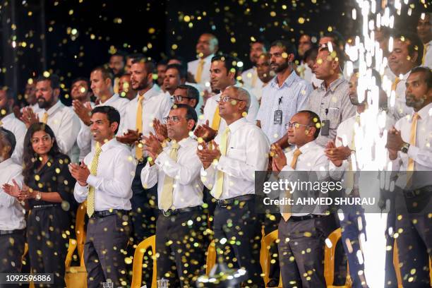 In this photograph taken on February 1 Maldives' former president Mohamed Nasheed , in the presence of current President Ibrahim Mohamed Solih ,...