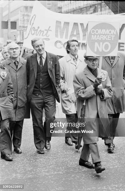 British politician, writer, and diarist Tony Benn , Secretary of State for Industry, and British Labour Party politician Dennis Skinner marching in...