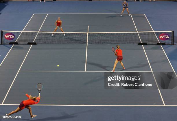 Johanna Larsson of Sweden, Kirsten Flipkens of Belgium, Anastasia Potapova of Russia and Dayana Yastremska of the Ukraine compete during the doubles...