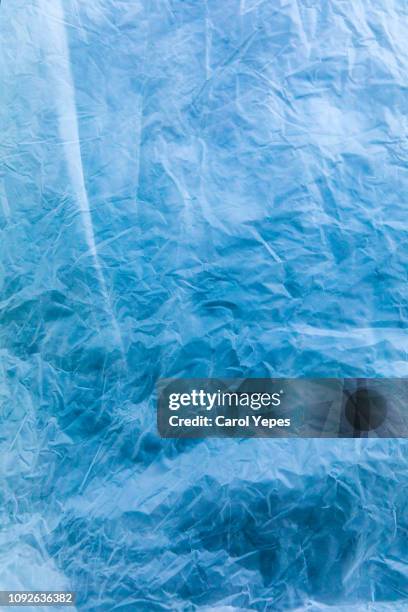 texture blue plastic bag.background. - stoffbeutel stock-fotos und bilder