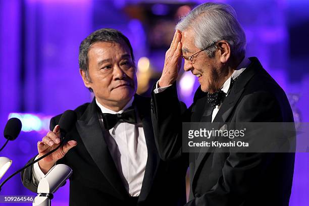 Actor Rentaro Mikuni reacts after joking with actor Toshiyuki Nishida during the 34th Japan Academy Awards at Grand Prince Hotel New Takanawa on...