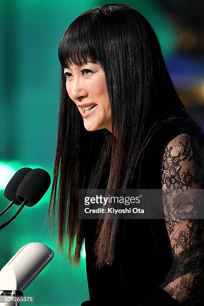 Actress Kimiko Yo presents the award for Best Actor in a Supporting Role onstage during the 34th Japan Academy Awards at Grand Prince Hotel New...
