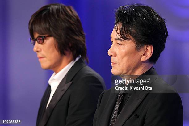 Actors Koji Yakusho and Etsushi Toyokawa attend the 34th Japan Academy Awards at Grand Prince Hotel New Takanawa on February 18, 2011 in Tokyo, Japan.
