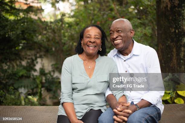 afro hispanic active senior together portrait - healthy older couple stock pictures, royalty-free photos & images