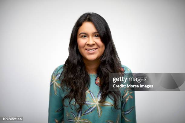 smiling young woman with long black hair - peruvian culture fotografías e imágenes de stock