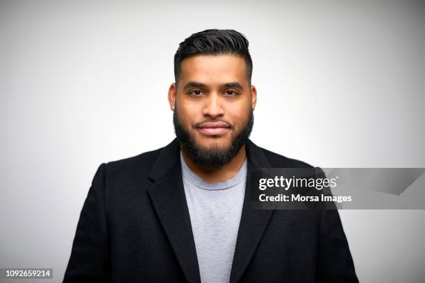 young man wearing blazer against white background - white jacket ストックフォトと画像