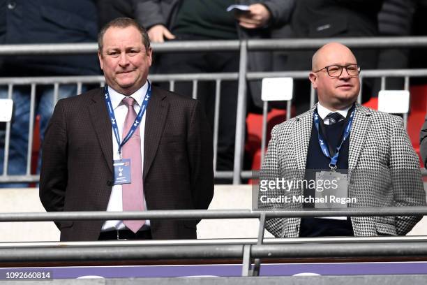 Mike Ashley, Newcastle United owner and Lee Charnley look on prior to the Premier League match between Tottenham Hotspur and Newcastle United at...
