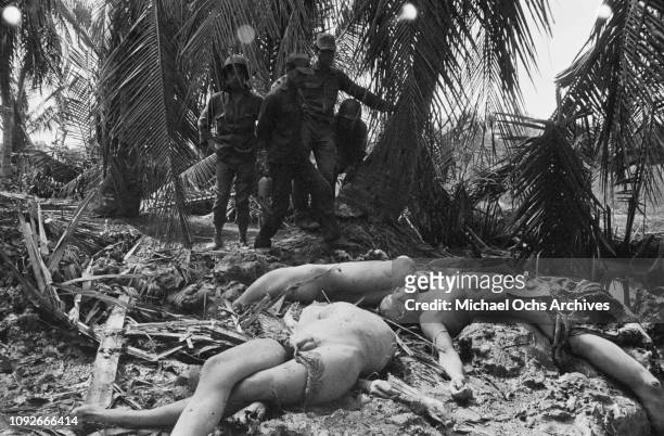 Contains death and graphic content - The naked corpses of Viet Cong fighters in South Vietnam, during the Vietnam War, 1st February 1965.