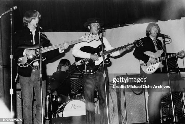American rock band The Byrds in concert, circa 1965. From left to right they are bass player Chris Hillman, drummer Michael Clarke, guitarist David...