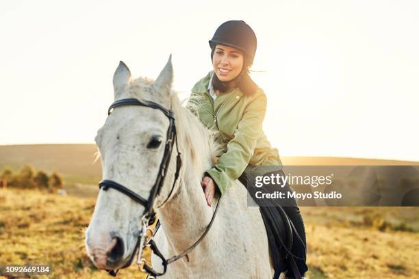 happiness is time spent in the saddle - animal riding stock pictures, royalty-free photos & images