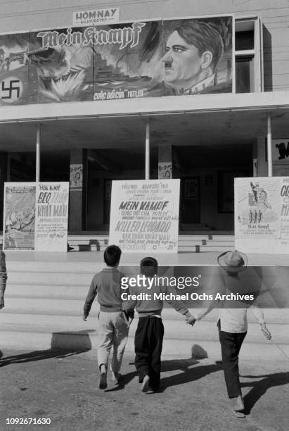 Cinema showing the films 'Mein Kampf' and 'Killer Leopard' in South Vietnam, during the Vietnam War, March 1962.