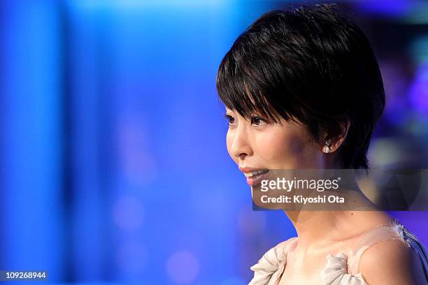 Actress Takako Matsu presents the award for Best Actor In A Leading Role on stage during the 34th Japan Academy Awards at Grand Prince Hotel New...