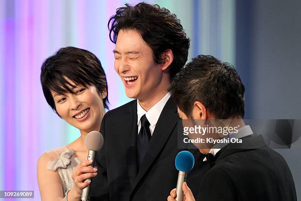 Actor Masaki Okada appears on stage during the 34th Japan Academy Awards at Grand Prince Hotel New Takanawa on February 18, 2011 in Tokyo, Japan.