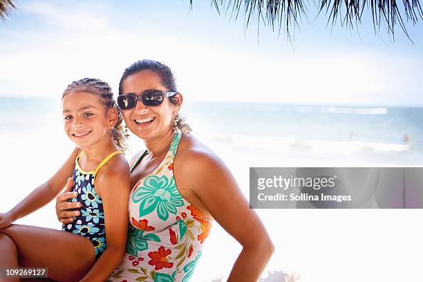 smiling mother and daughter enjoying tropical beach - hot mexican girls stock pictures, royalty-free photos & images