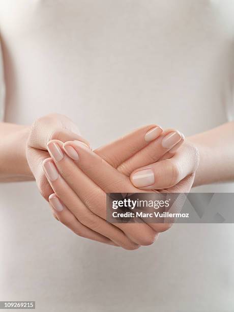 woman with hands cupped, close-up - hands cupped stock pictures, royalty-free photos & images