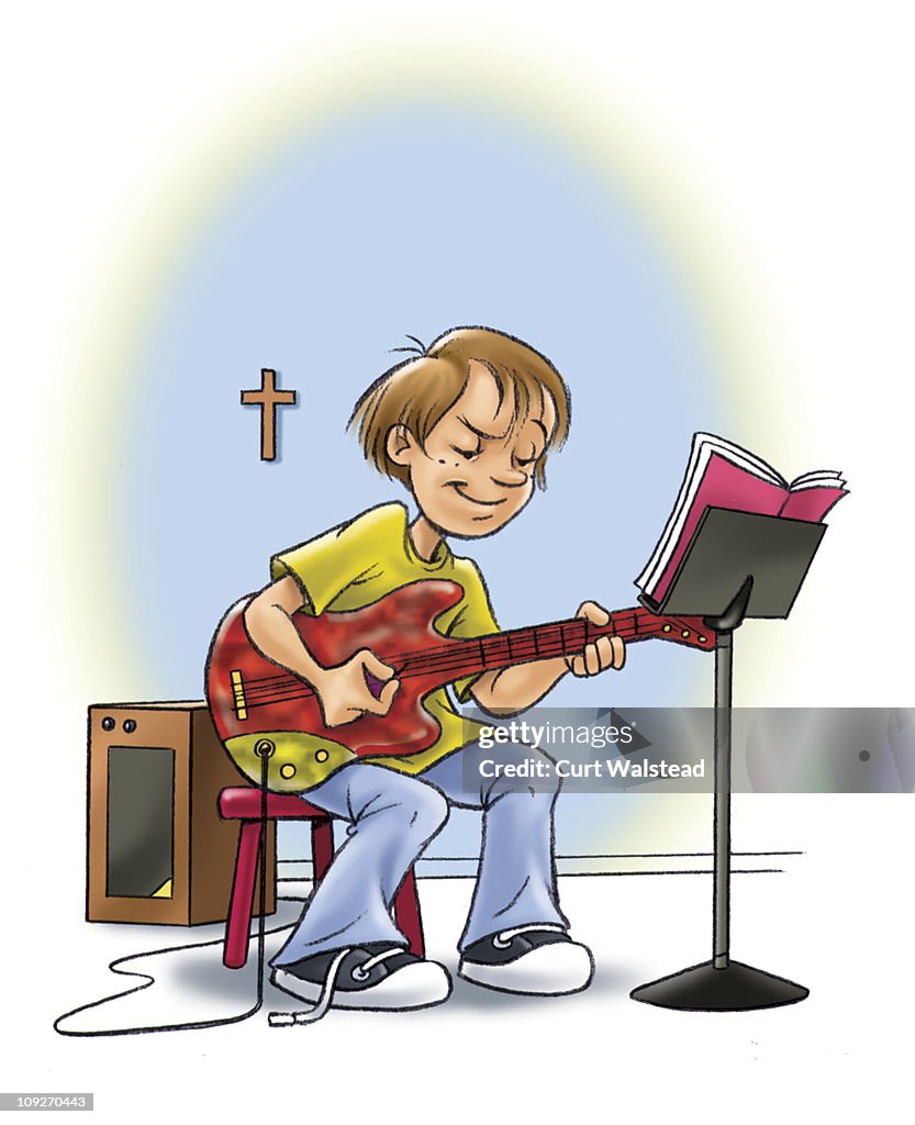 A boy playing an electric guitar