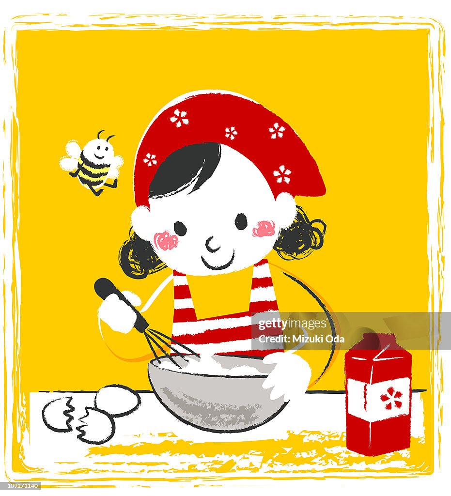 A girl mixing cooking ingredients in a bowl