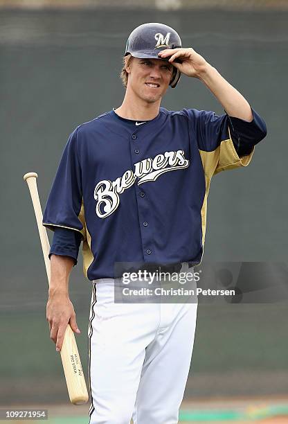 Zack Greinke of the Milwaukee Brewers participates in bunting drills during a MLB spring training practice at Maryvale Baseball Park on February 18,...