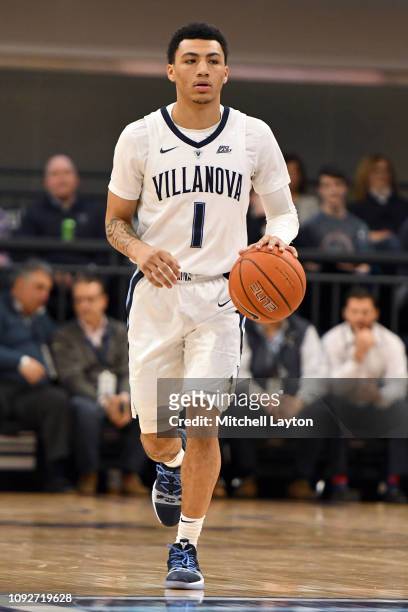 Jahvon Quinerly of the Villanova Wildcats dribbles up court during a college basketball game against the St. John's Red Storm at the Finneran...