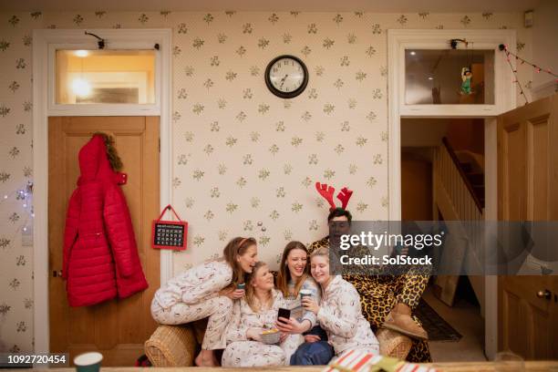 silly christmas selfies - matching outfits stock pictures, royalty-free photos & images