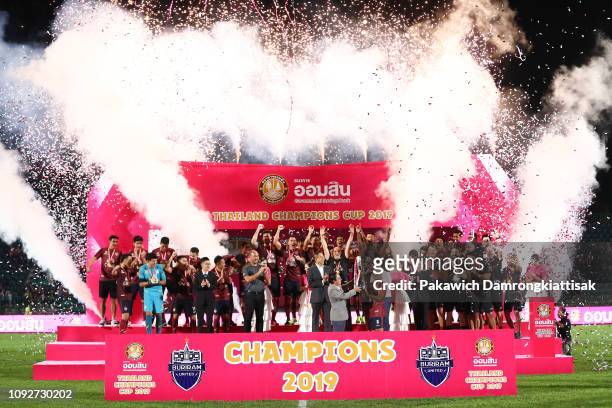 Buriram United players and staff celebrate Omsin Thailand Champions Cup 2019 trophy after the Omsin Thailand Champions Cup match between Buriram...