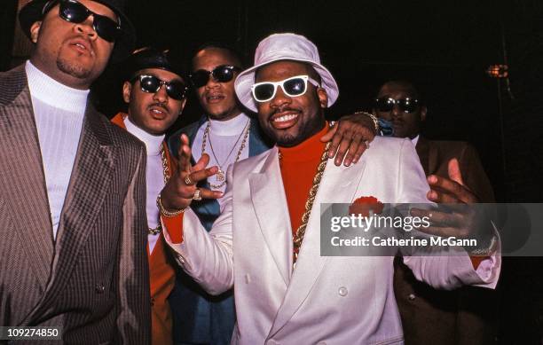 Hip Hop artist Jam Master Jay of Run DMC and friends pose for a photo at a party for the release of Run DMC's album "Tougher Than Leather" on...