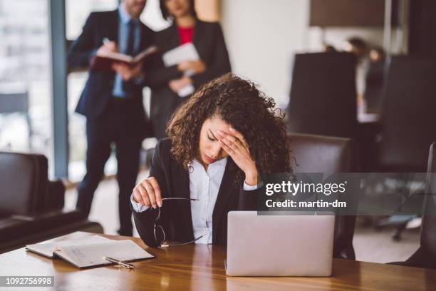 businesswoman having problems in the office - crying sad african woman stock pictures, royalty-free photos & images