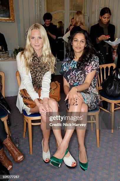 Poppy Delevingne and Saloni Lodha attend the presentation of Saloni's A/W 2011 collection during London Fashion Week on February 18, 2011 in London,...