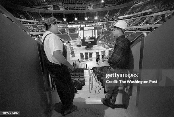 David McNair , ironworker , and Mark Brum supervisor for Clark / Smoot construction talk as final preparations take place. CREDIT: Joel Richardson...