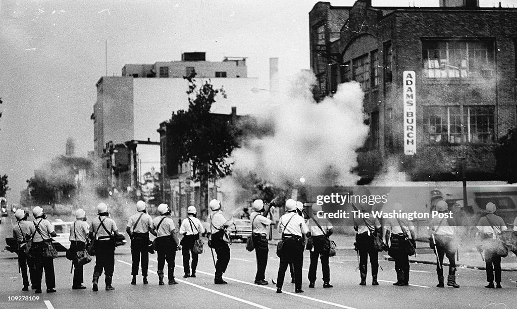 APRIL 1968 - A busload of Civil Disturbance Unit police sweeps 14th Street and saturates the area wi