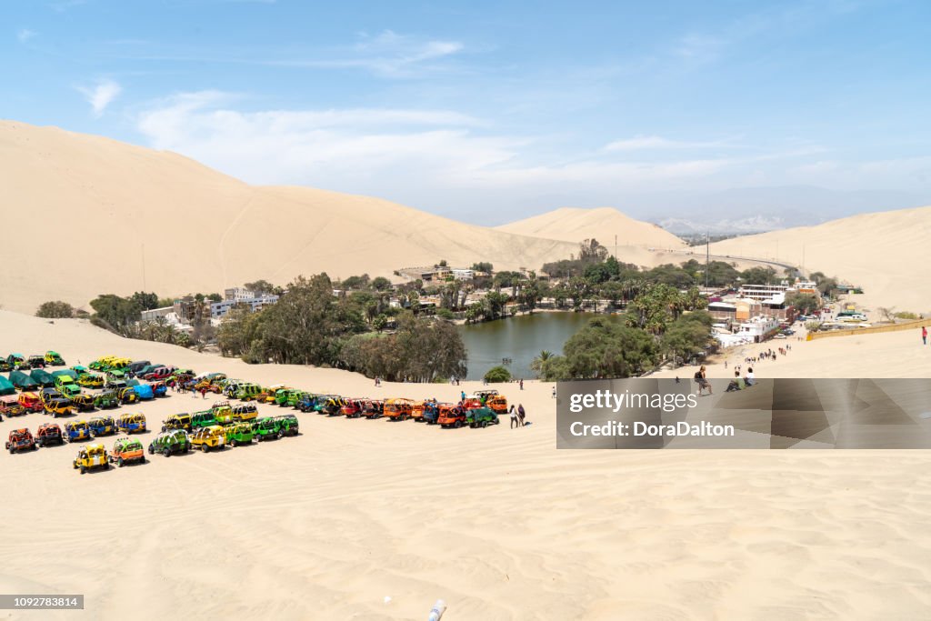 Beach buggy on beside Oasis in Huacachina, Peru