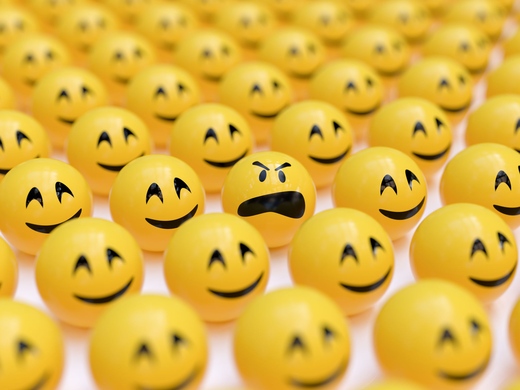 Angry Smiley Between Happy Ones Angry Smiley Between Happy Ones