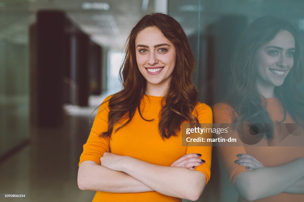 Smiling businesswoman at work