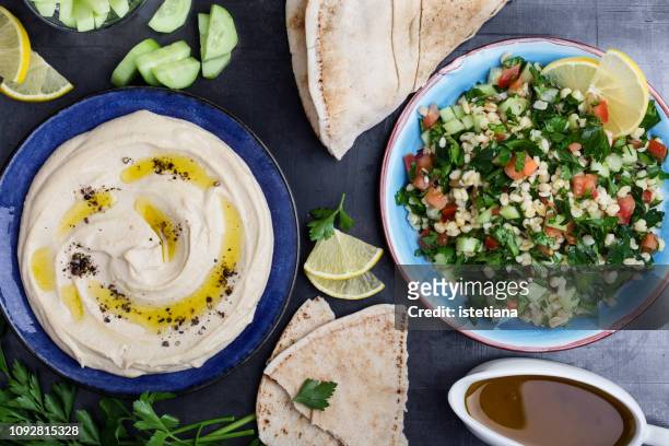 healthy vegan meal background with fresh herbs and vegetables - lebanese photos et images de collection