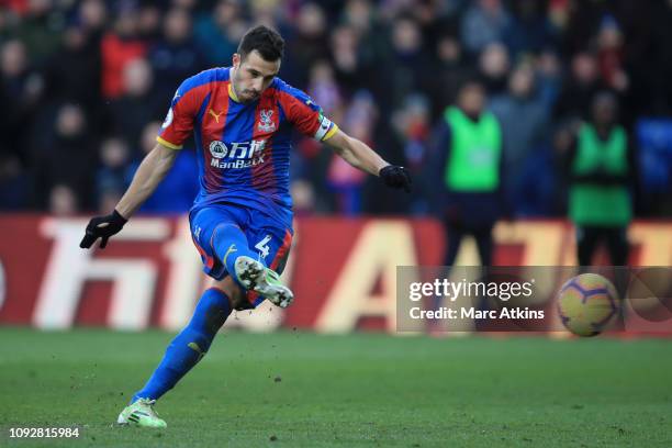 Luka Milivojevic of Crystal Palace scores his team's first goal from the penalty spot during the Premier League match between Crystal Palace and...