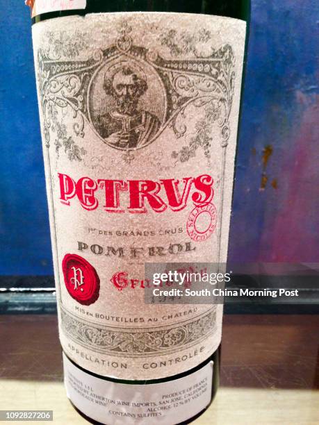 Counterfeit bottle of Petrus where St Peter looks more like Osama bin Laden as fake wine expert Maureen Downey says. The letters in the name Petrus...