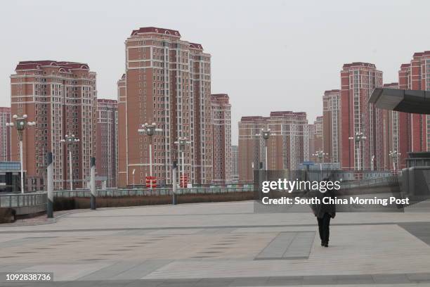 Residential buildings in which only few people actually living in Kangbashi district, Ordos city, Inner Mongolia, on Feb. 16, 2017. Kangbashi is a...