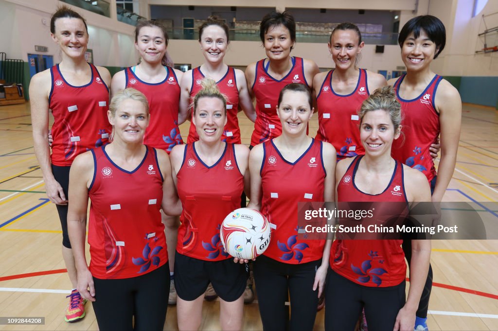 Hong Kong netball team (Front Row, L to R) Michelle Warburton, Julia Broughton, Krystle Edwards and Victoria Smith, (Back row, L to R) Elise Daly, Mandy Tai, Kale Jolly, Connie Wong, Anna Pinder and Angela Chan, pose for a picture at South Island School i