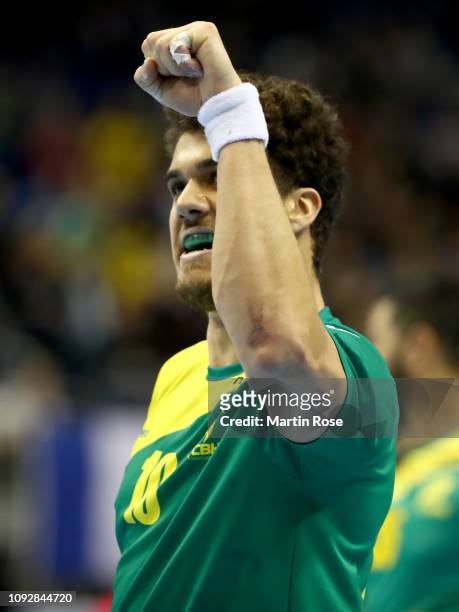 Jose Toledo of Brazil celebrates during the 26th IHF Men's World Championship group A match between Brazil and France at Mercedes-Benz Arena on...