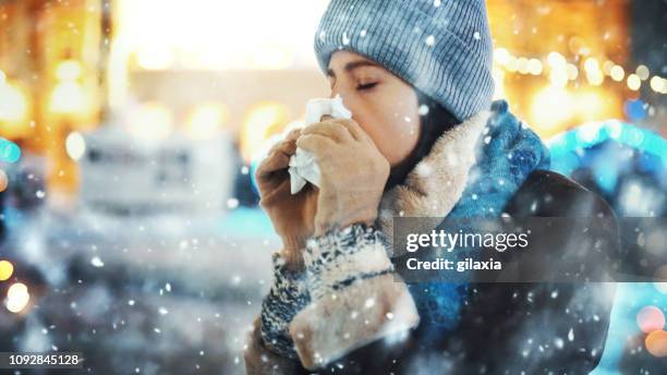 winter cold. - woman snow outside night stock pictures, royalty-free photos & images