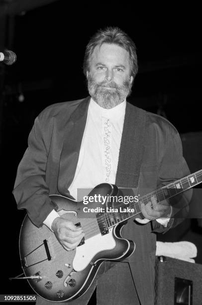 Guitarist Carl Wilson of The Beach Boys performs at Allentown Fairgrounds on September 2, 1992 in Allentown, Pennsylvania.