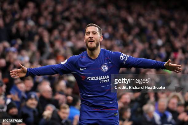 Eden Hazard of Chelsea celebrates after scoring his team's third goal during the Premier League match between Chelsea FC and Huddersfield Town at...