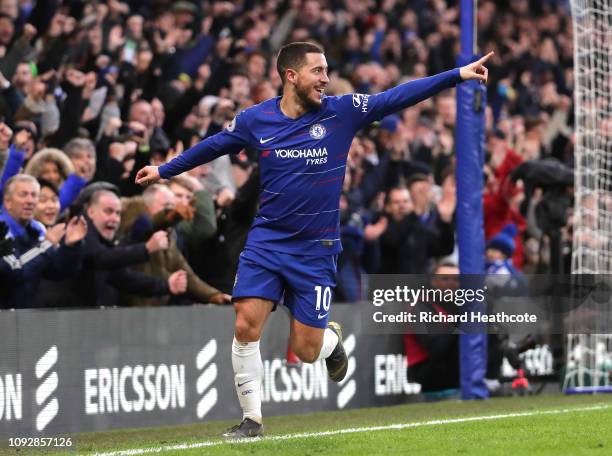 Eden Hazard of Chelsea celebrates after scoring his team's third goal during the Premier League match between Chelsea FC and Huddersfield Town at...